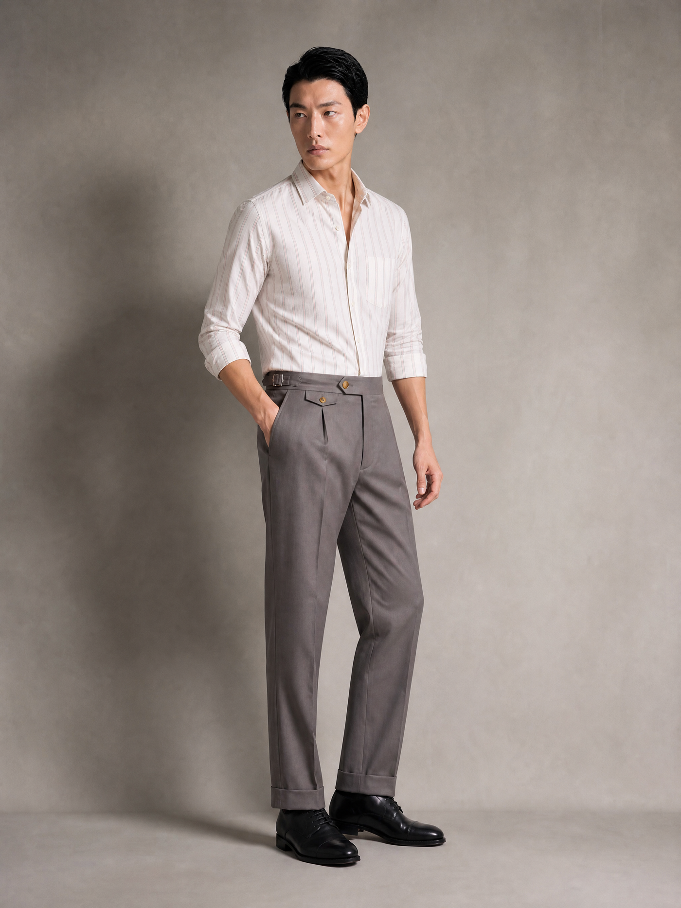 Taupe cotton twill trouser, high-rise single pleat with side adjusters and turn-up cuffs