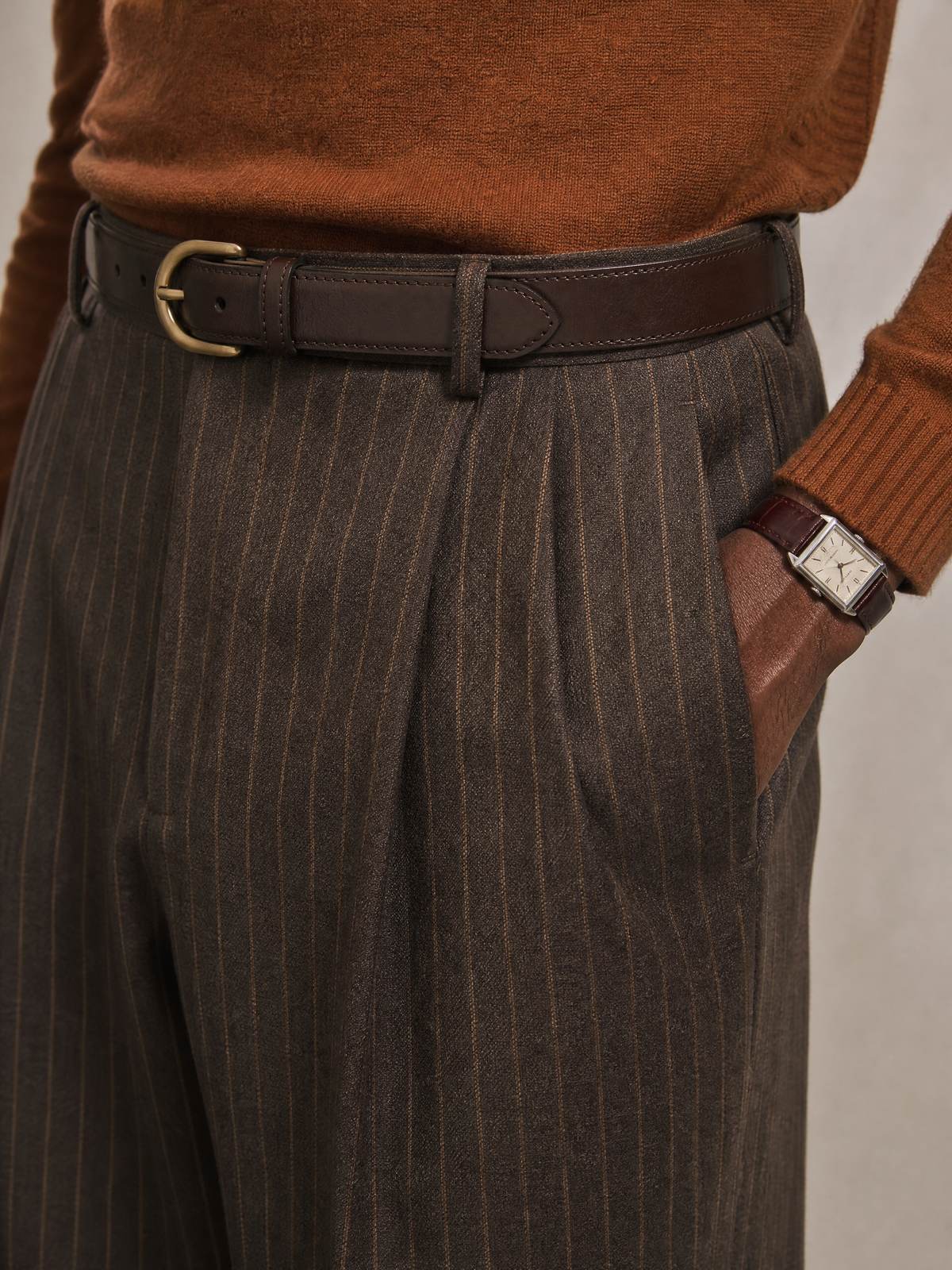 Merino wool blend trouser in brown stripe — double pleated, hemmed to a full break